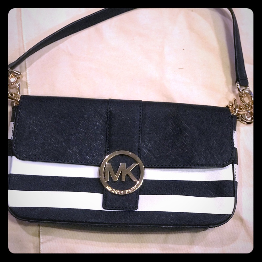 Navy blue and white Michael Kors clutch